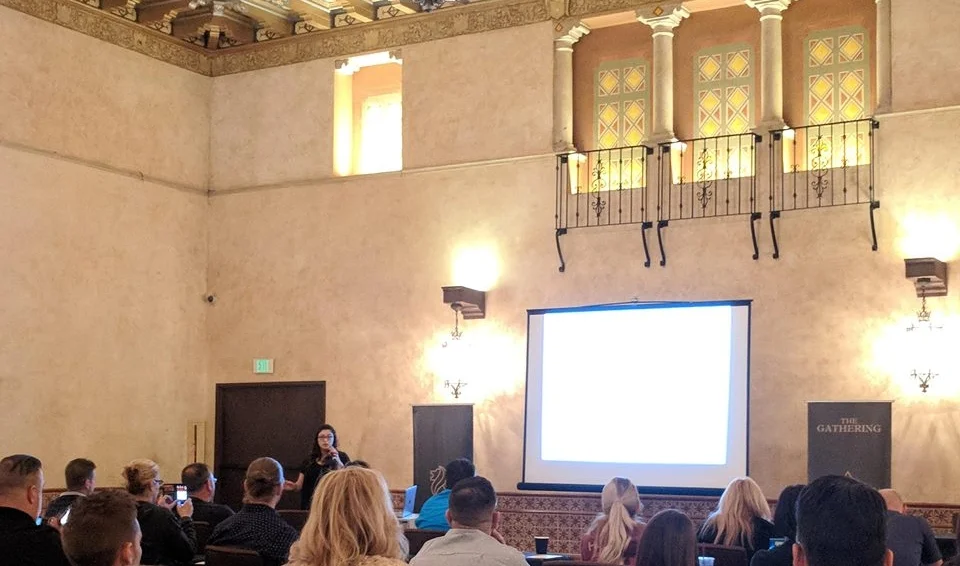 Hannah speaking at an event at The Roosevelt Hotel in Hollywood