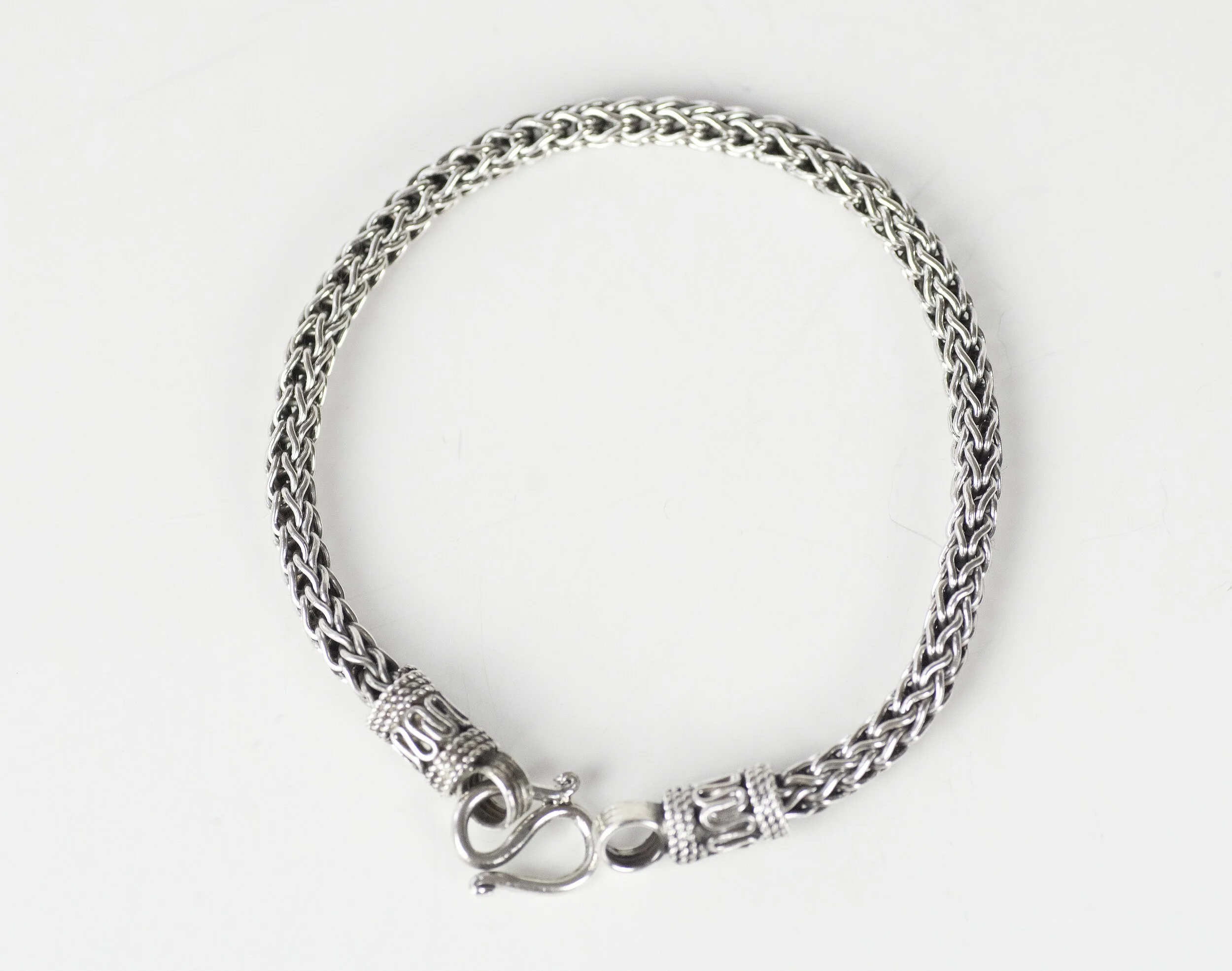 silver-braided-bracelet-flat-lay.jpg