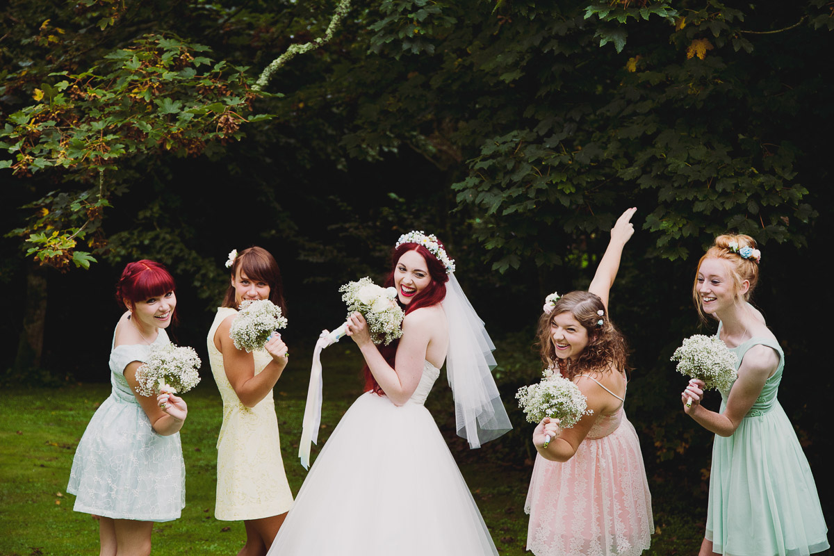 Bride and Bridesmaids having fun - UK Alternative Wedding Photography Chloe Lee Photo