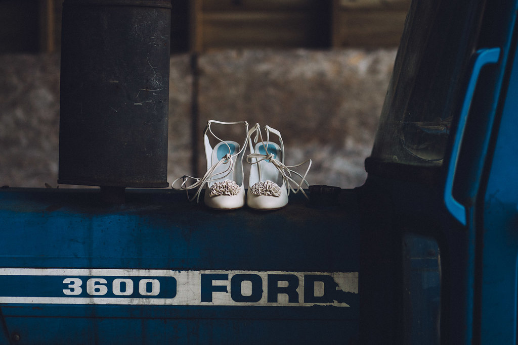 Wedding Shoes on a Tractor - Captains Wood Barn Essex