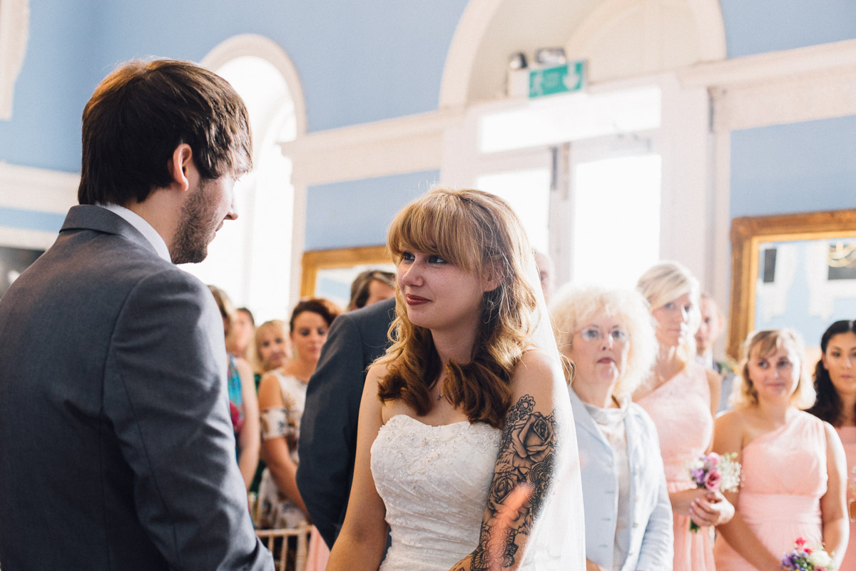 Bride and Groom Look at each other during wedding ceremony