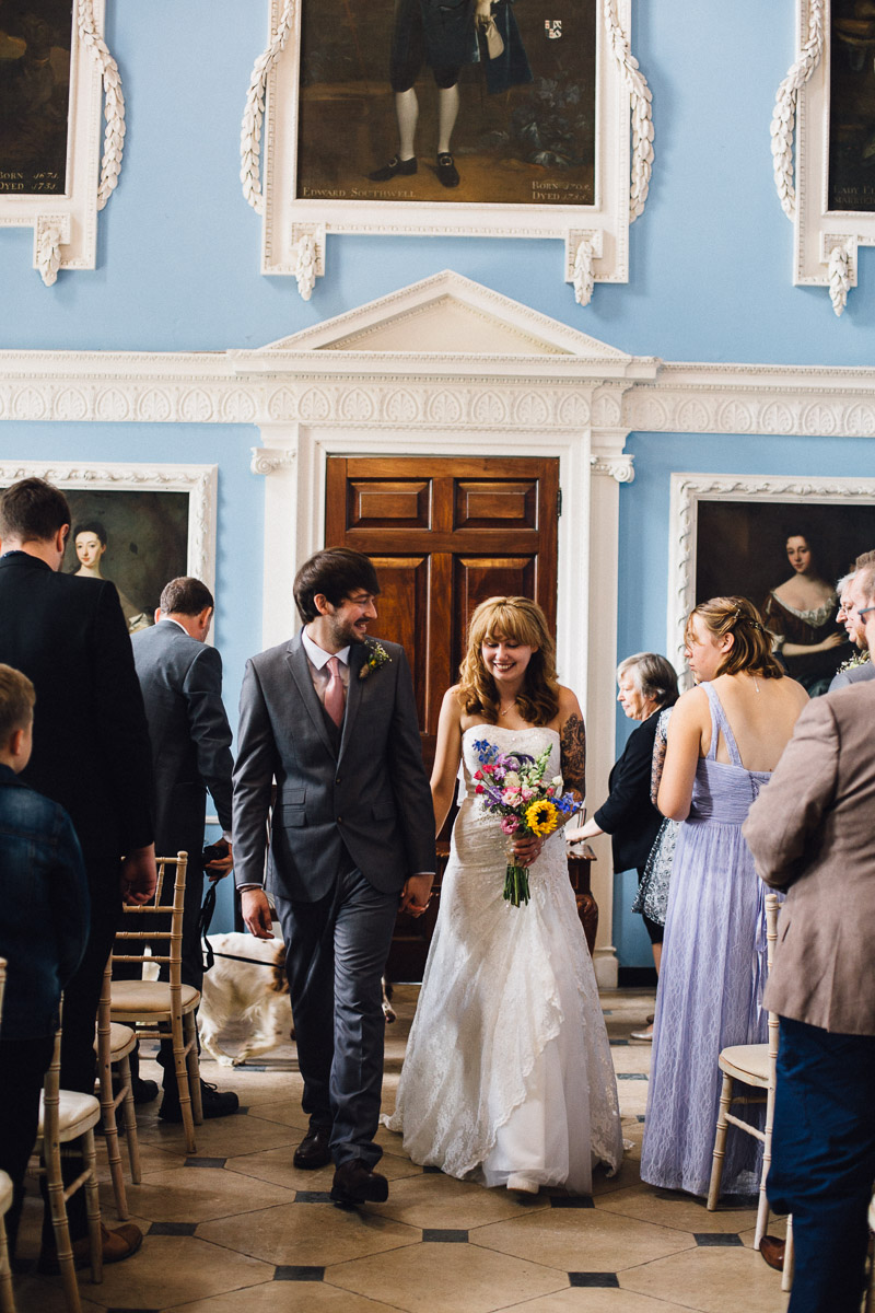 Bride and Groom Walk up Aisle