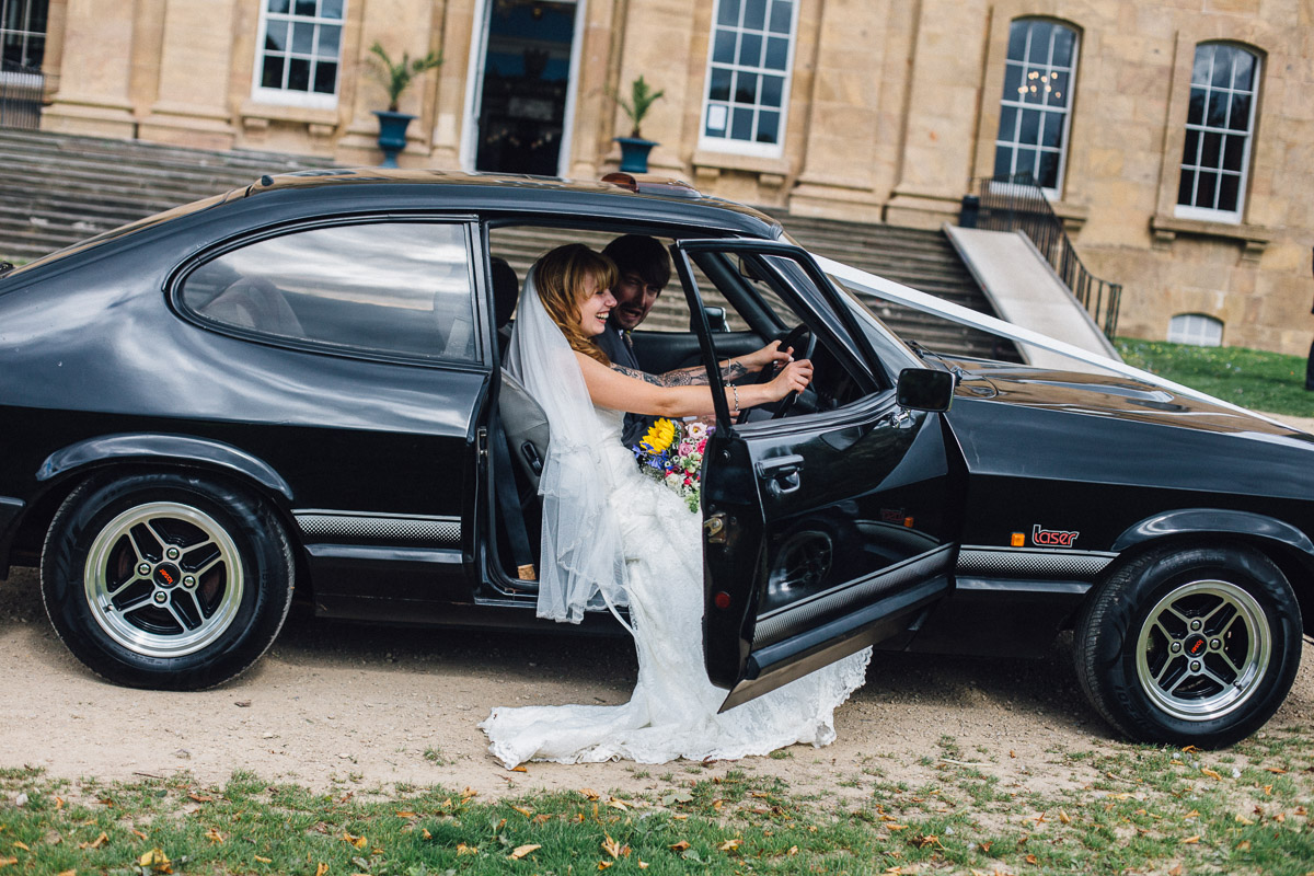 Bride Pretending to Drive Wedding Car