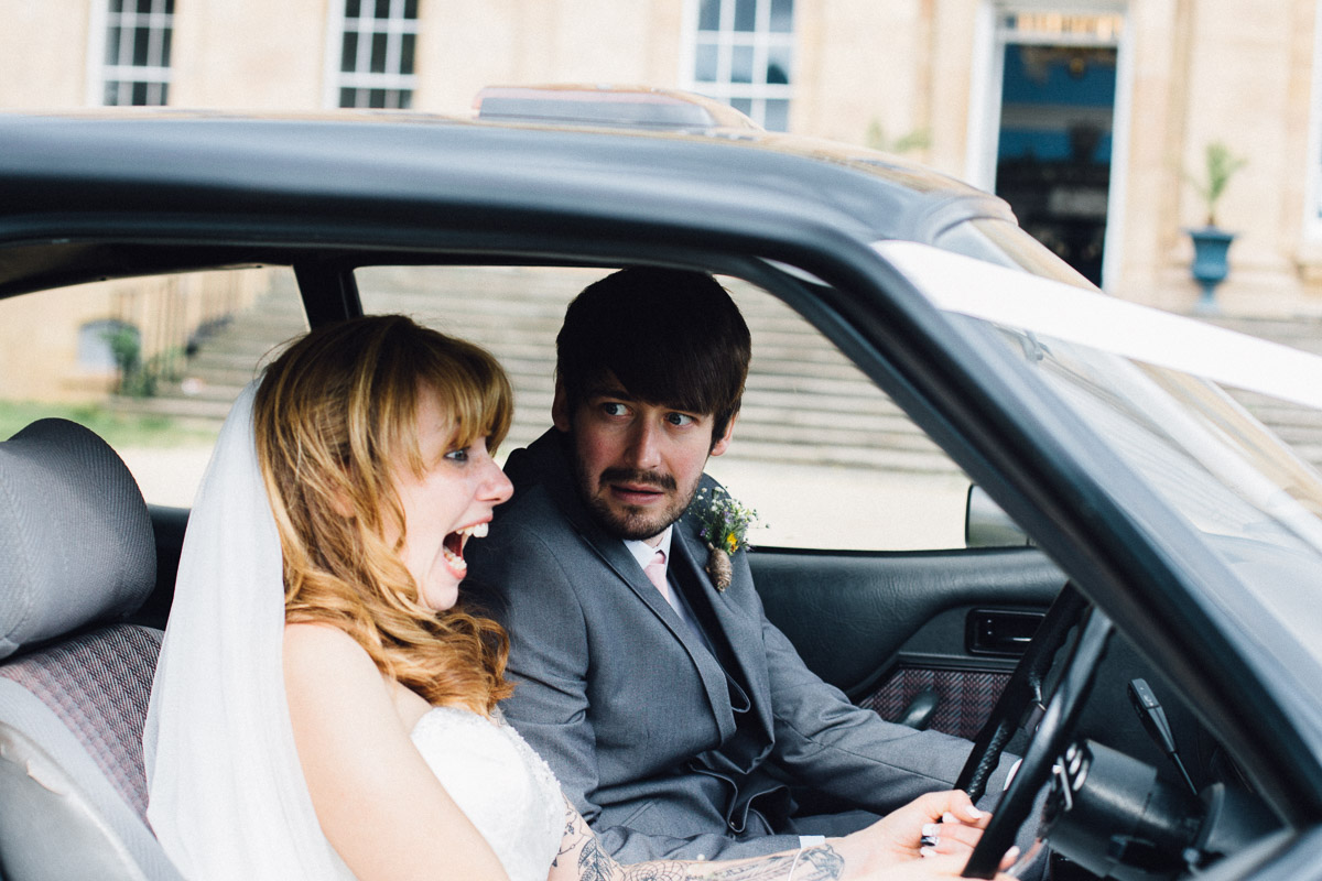 Bride Pretending to drive Wedding Car