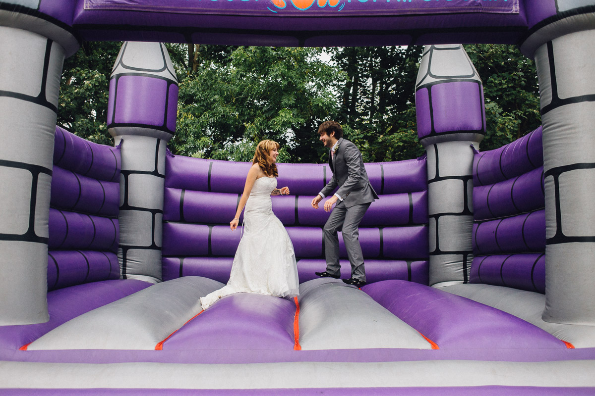 Bride and Groom on Bouncy Castle