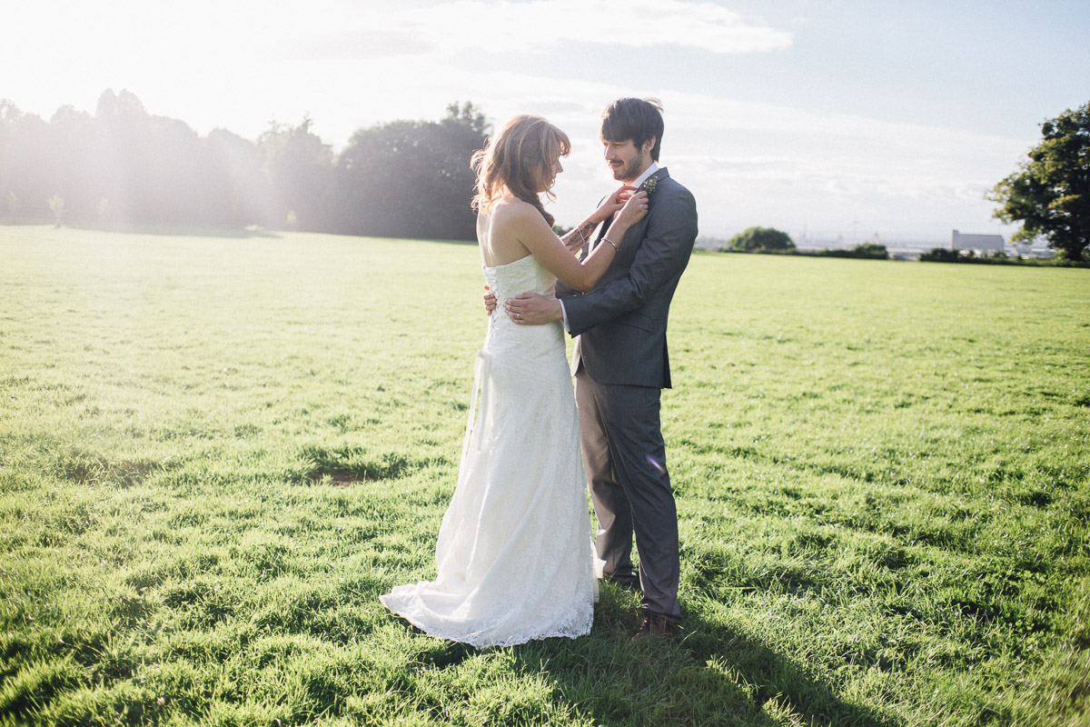 Backlit Sun Couple Portraits in Field