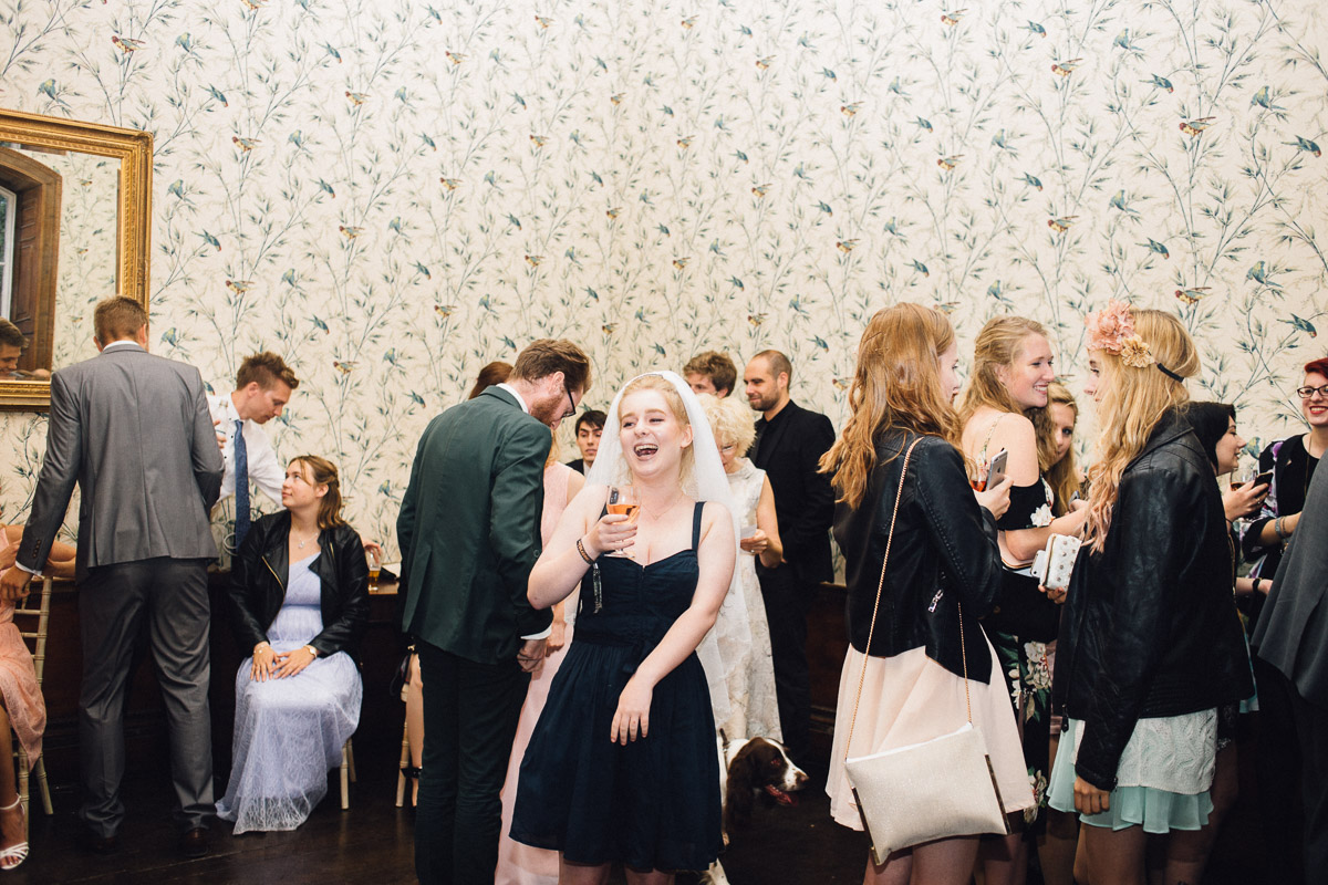 Wedding Guest Wears Brides Veil on Dance Floor