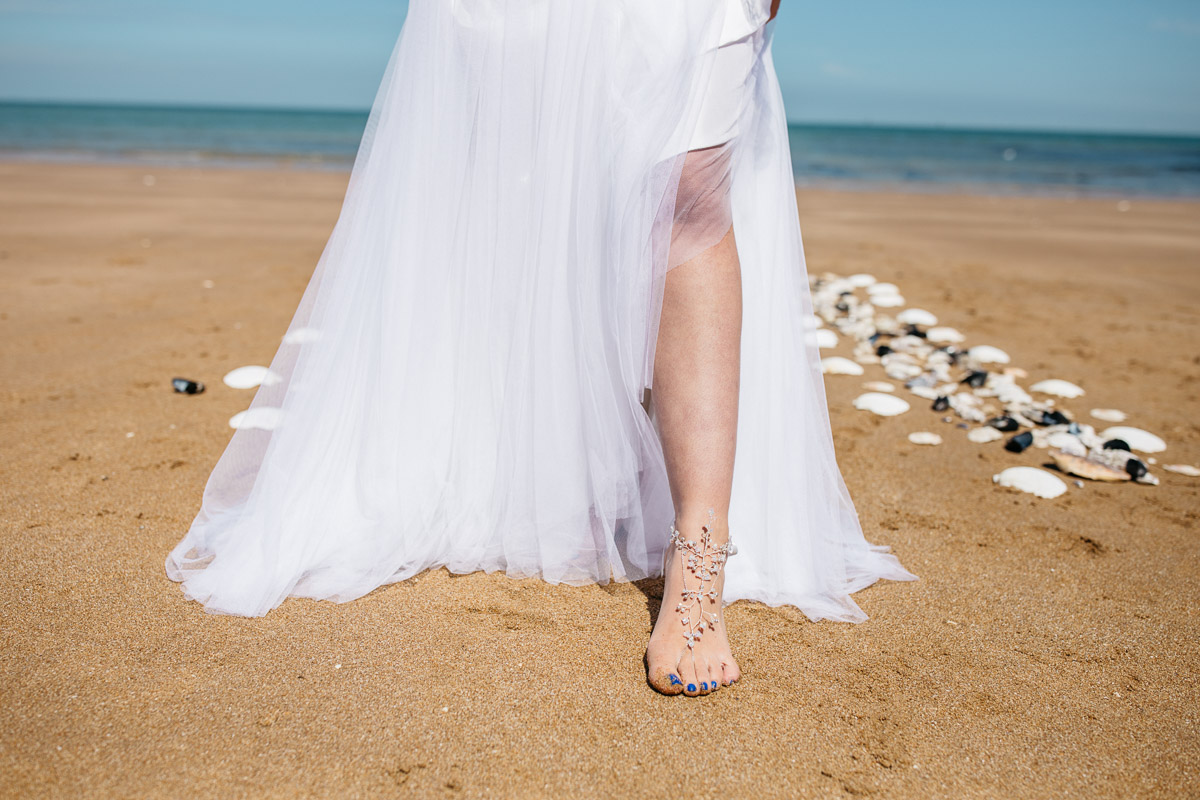 Boho Bride Walking on Beach