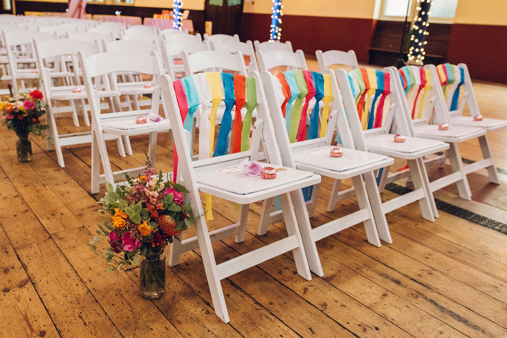 Chairs with coloured paper streamers