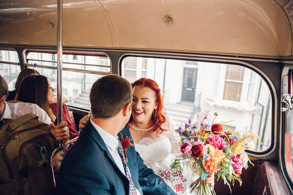 Couple on Red Bus Stoke Newington Town Hall Wedding - London Wedding Photographer