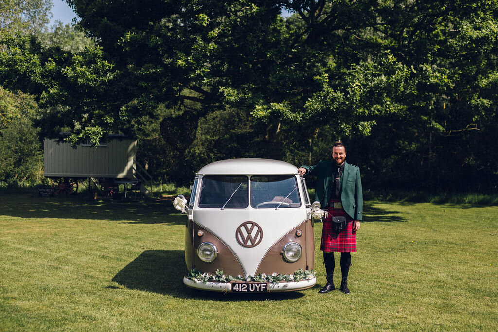Boho Woodland Wedding Tey Brook Orchard, Browning Bros, Essex - Groom in Kilt by VW camper Van