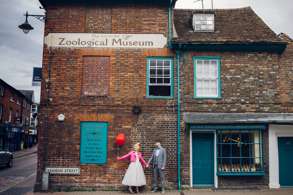 Bride Wearing Pink Leather Jacket Holding Balloon - Colourful Wedding Photography