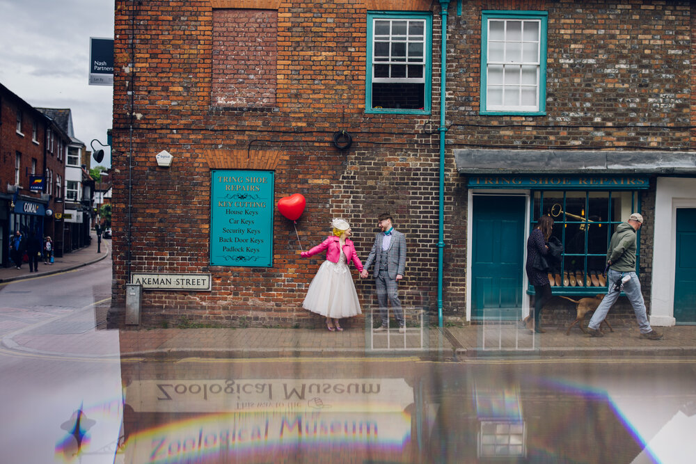 Bride Wearing Pink Leather Jacket Holding Balloon - Colourful Wedding Photography