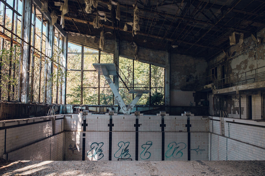 Travel photography - Chernobyl exclusion zone and Pripyat tour abandoned swimming pool 