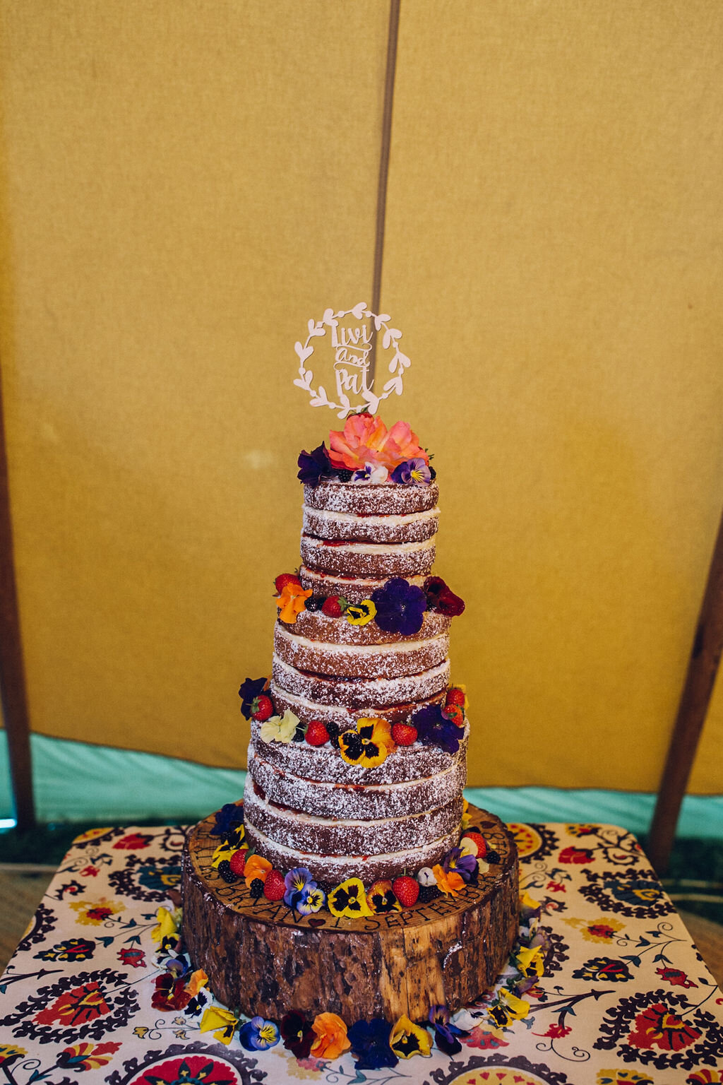 Bright Flower Naked Wedding Cake  - Colourful Festival Wedding Essex