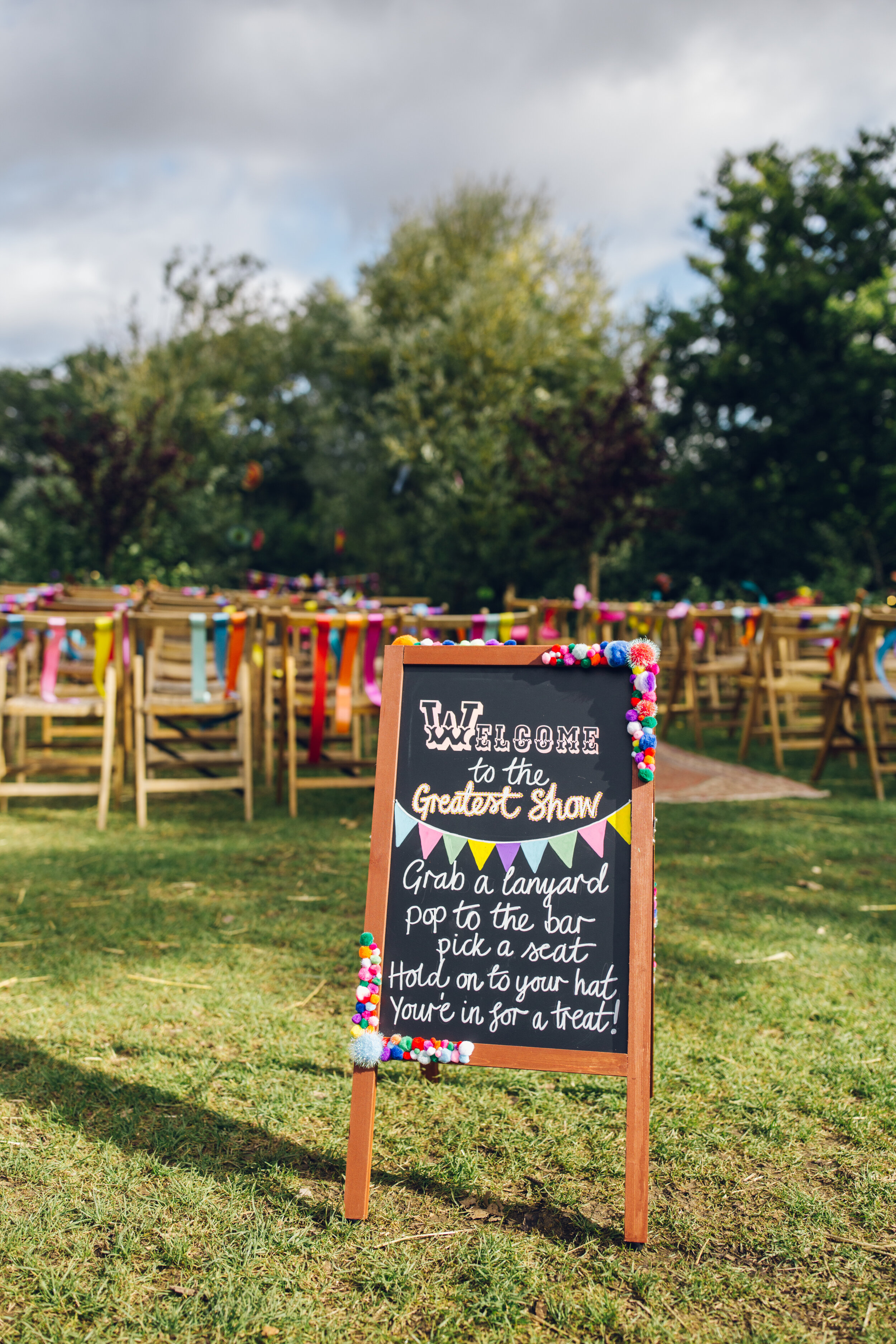 Greatest Show Welcome Sign Colourful Wedding Photography