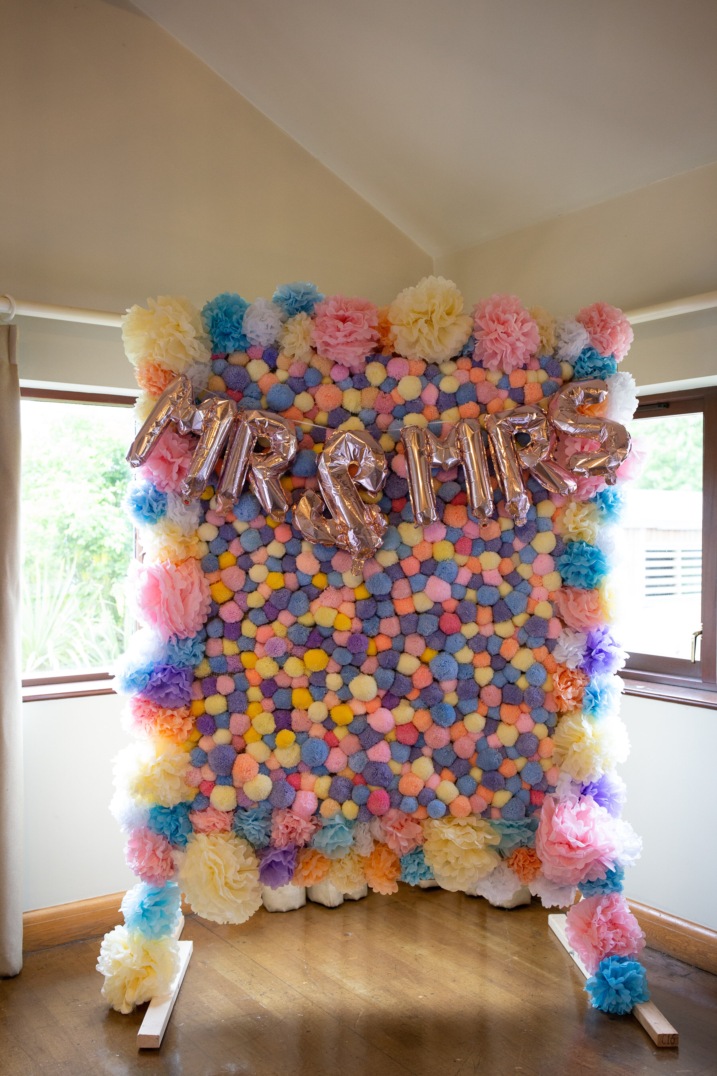 Colourful Wedding Photography - Pom Pom Wall