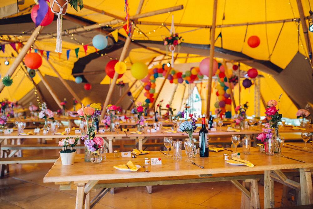 Colourful Wedding Photography in Tipi with paper lanterns and flowers