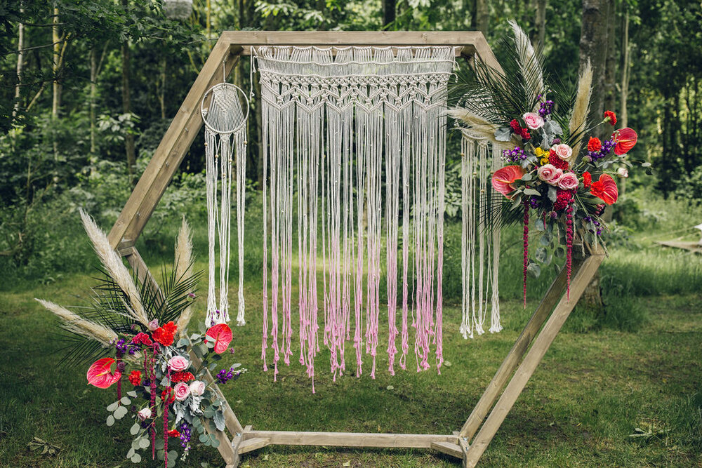 Colourful Boho Wedding Photography -Browning Bros Essex Festival Wedding Macrame Backdrop