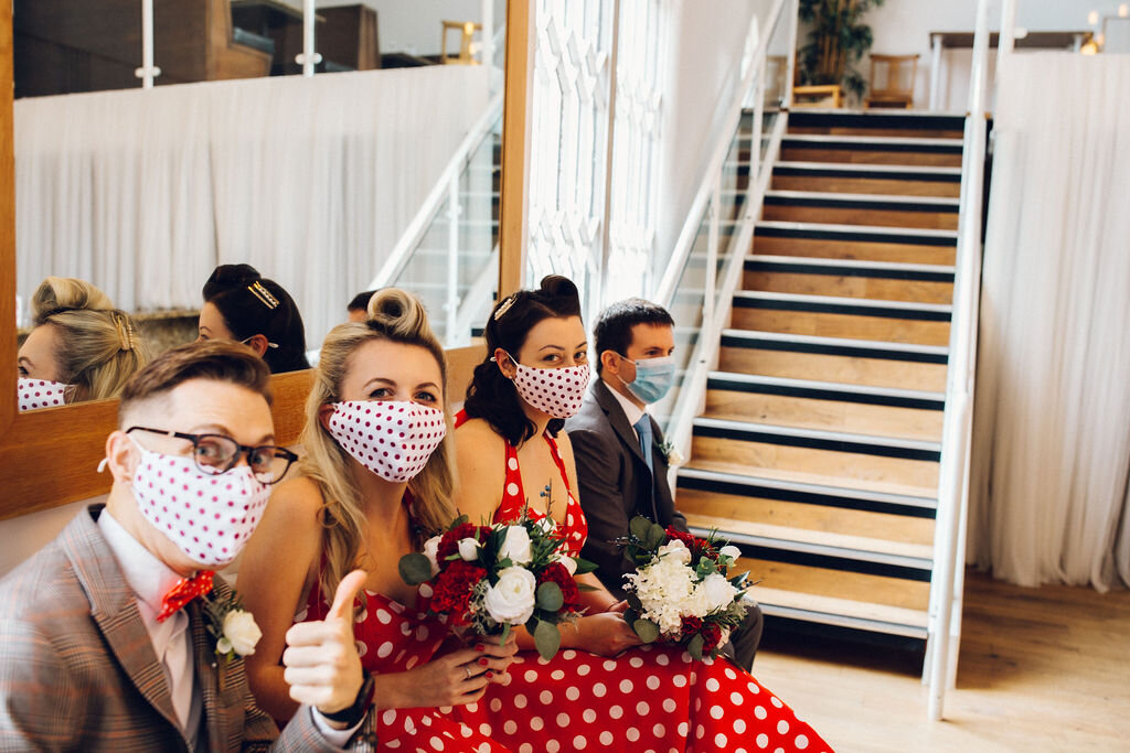 Bridal party wear covid masks during ceremony - Intimate Essex wedding Old Parish Rooms