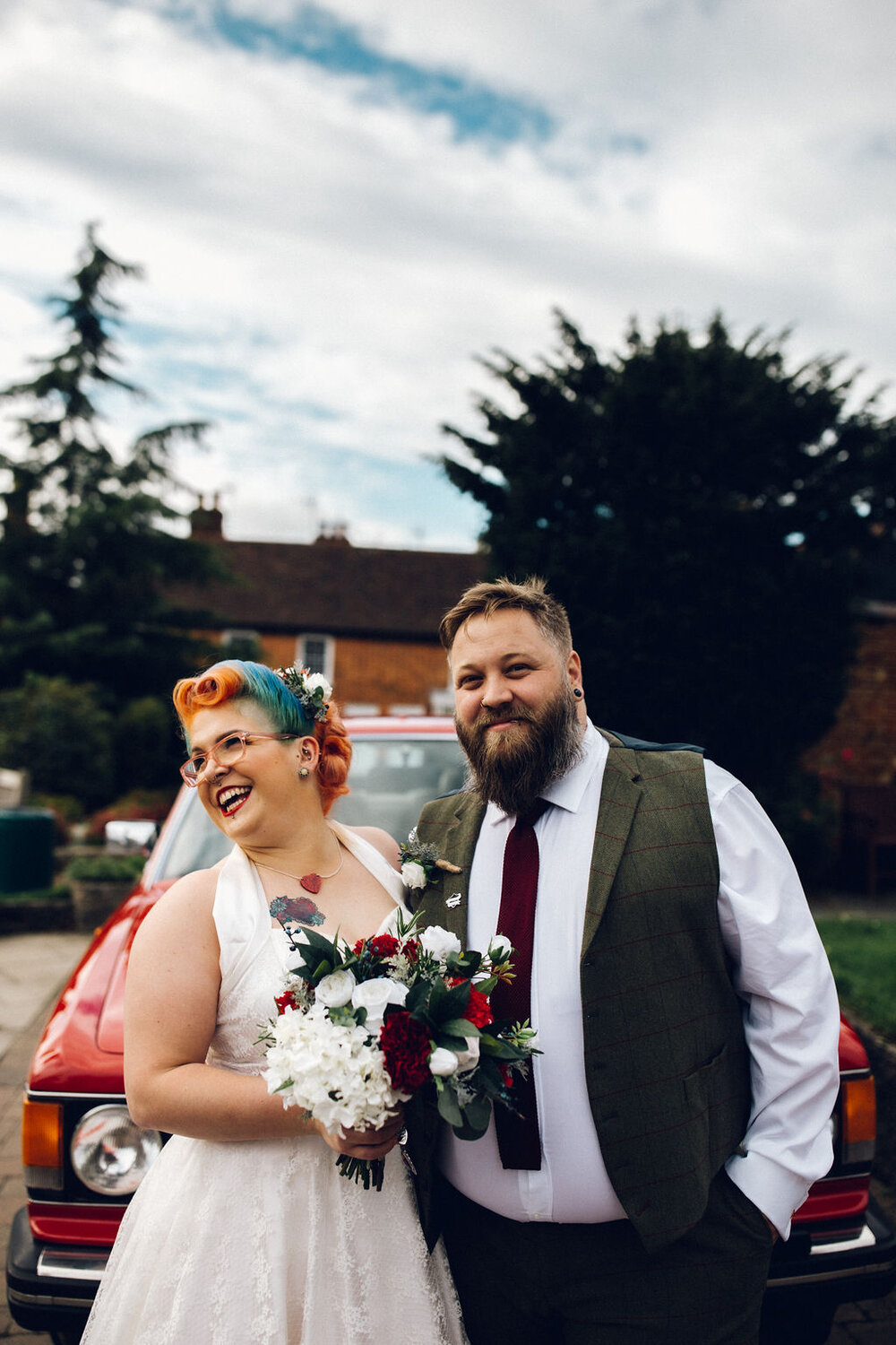 Bride with rainbow hair and groom outside - Intimate Essex wedding Old Parish Rooms