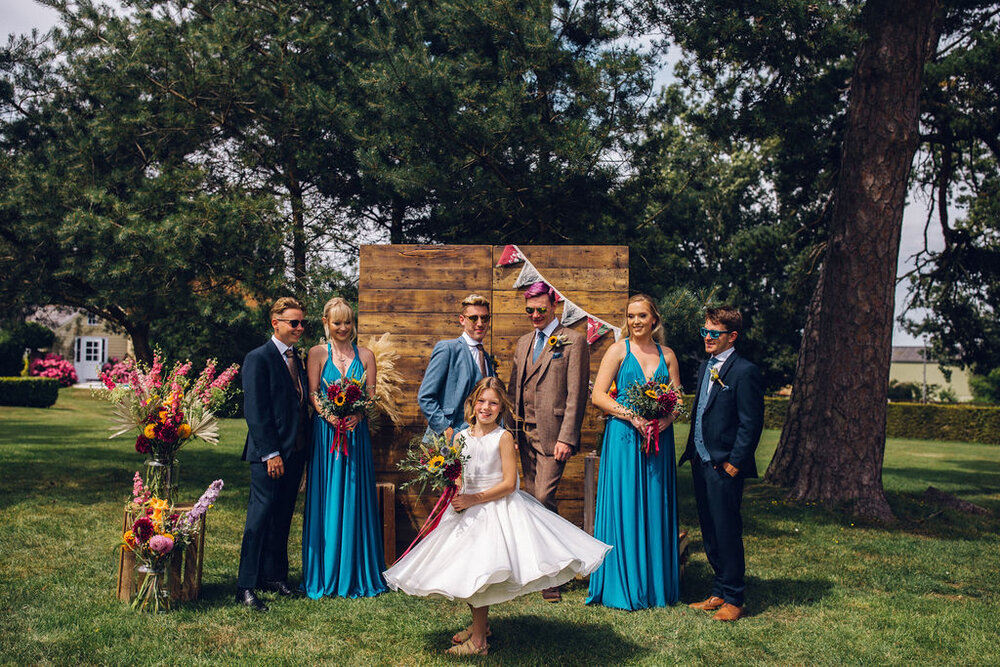 Colourful same sex festival wedding inspiration Barnston lodge Essex