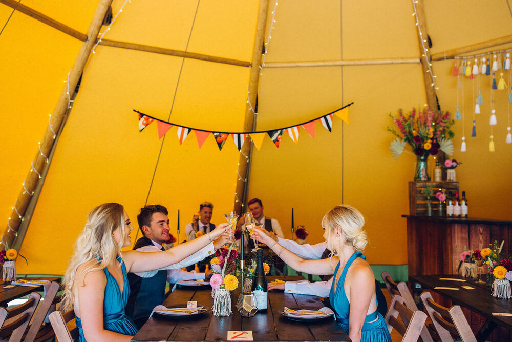 Colourful same sex festival wedding inspiration Barnston lodge Essex