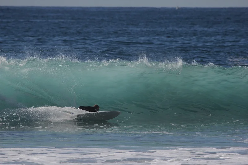 Laying into one with Chris Beresford. Pic Bradford Colwell