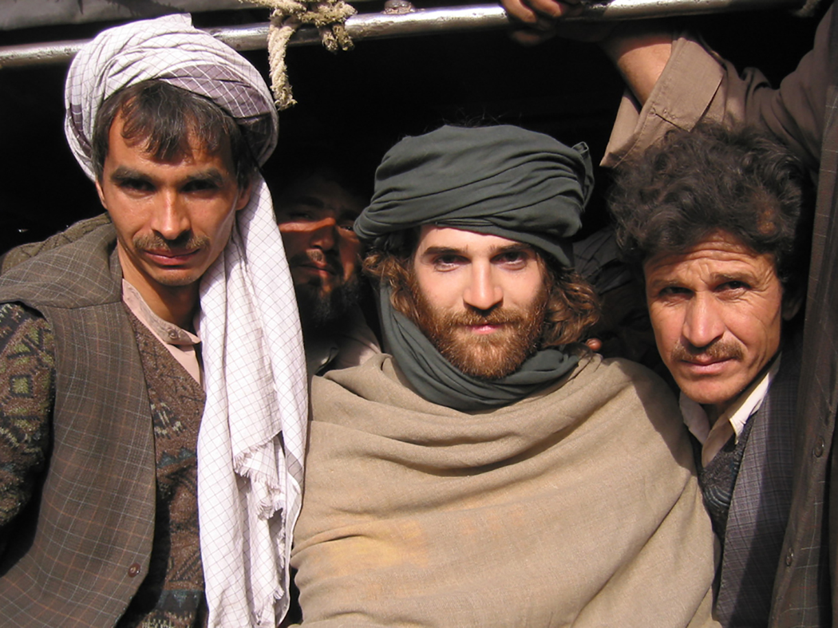 Best way to get through a checkpoint? Dress up. In northern Afghanistan, 2002