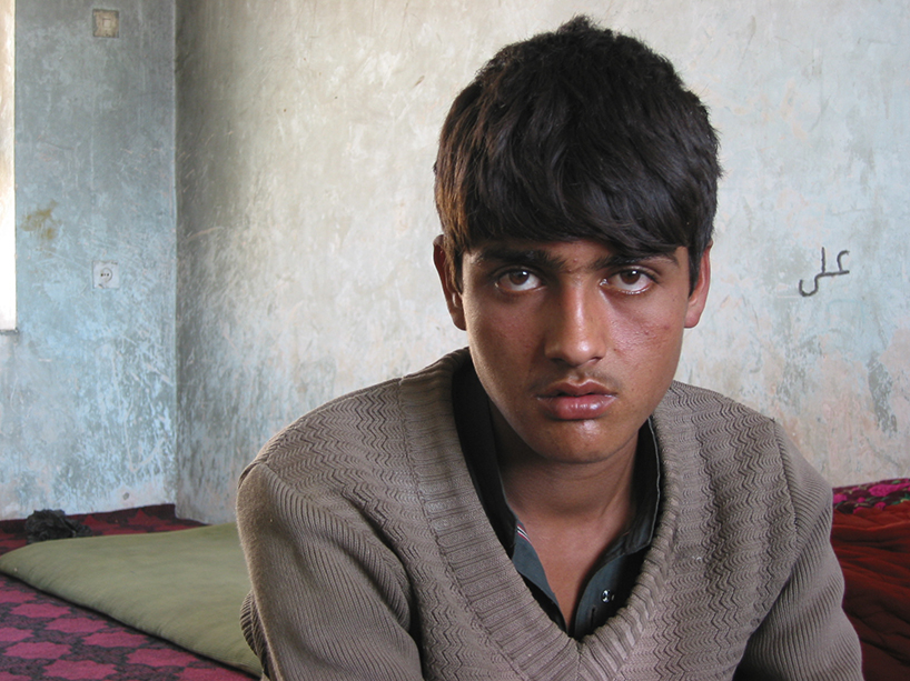 Bahram, the Taliban prisoner boy, in captivity. Northern Afghanistan, 2002