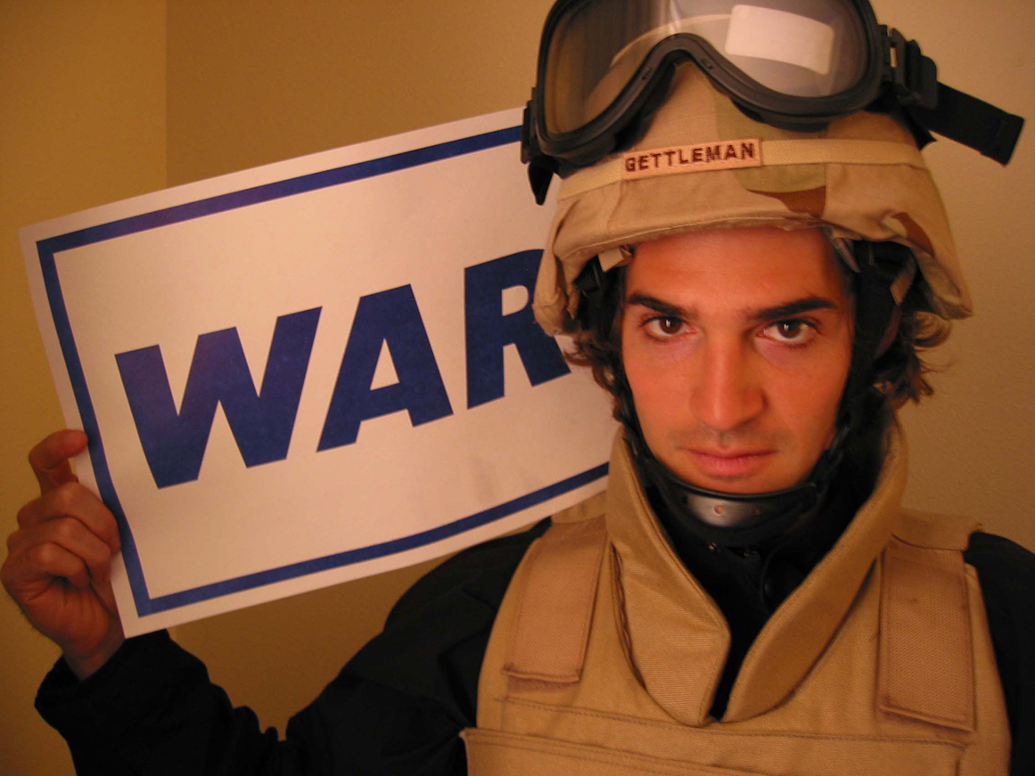 The day the Iraq war began, March 20, 2003. The sign is an old-fashioned "rack card" from a sidewalk newspaper vending machine (‘member those?)