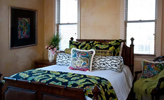 Islandreams Textiles fabrics accentuate the soothing Coastal style of this inviting guest room.
