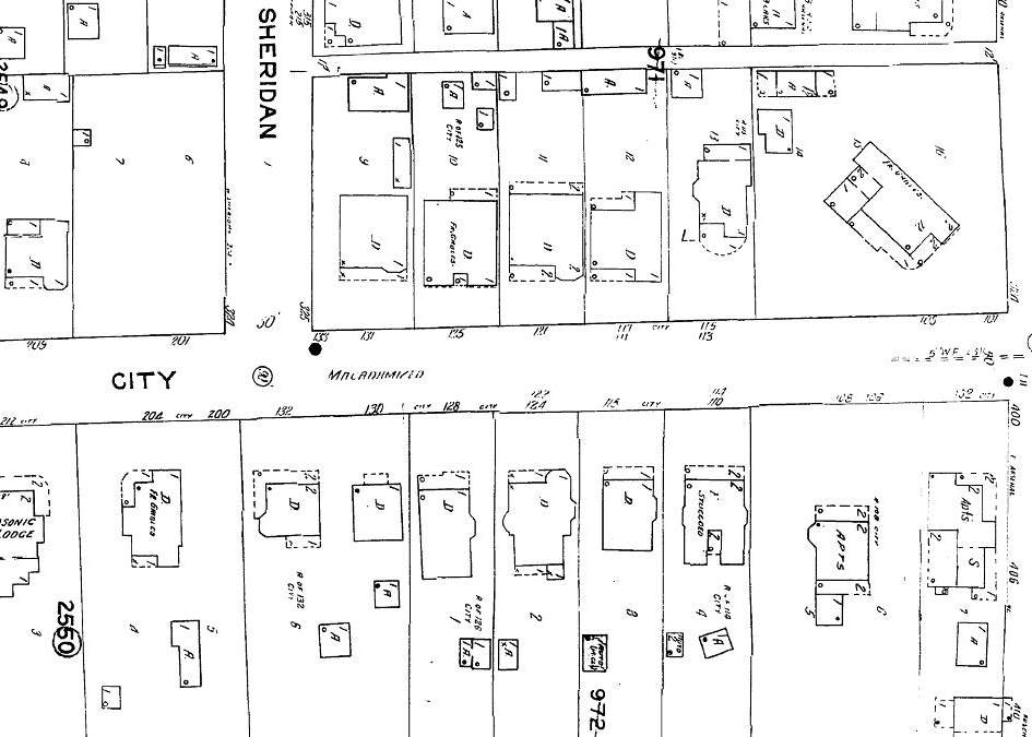 Sanborn Insurance Maps indicated roofing material in the corners of each structure. 