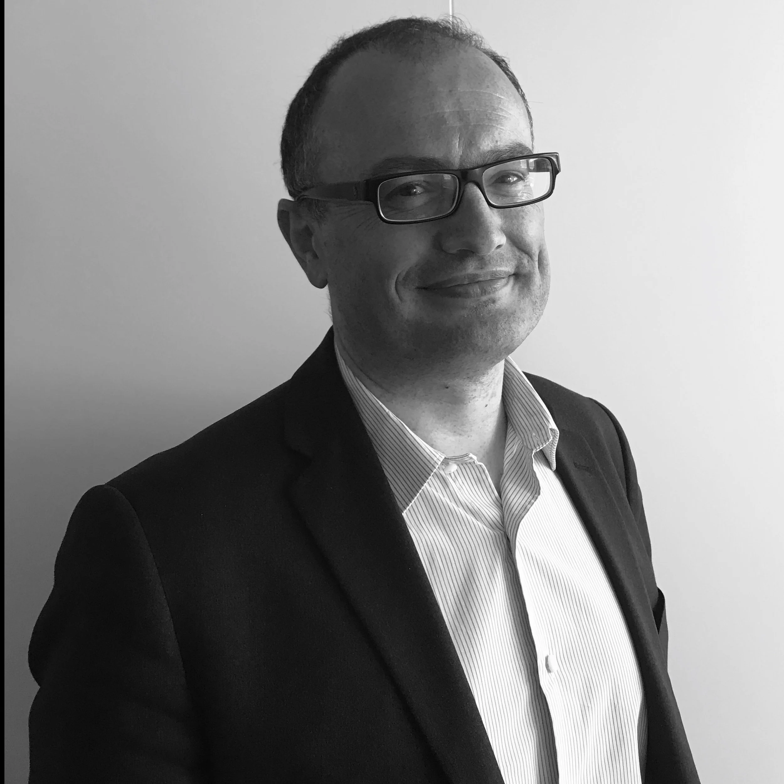 REGIS COMBALUSIER Board Member