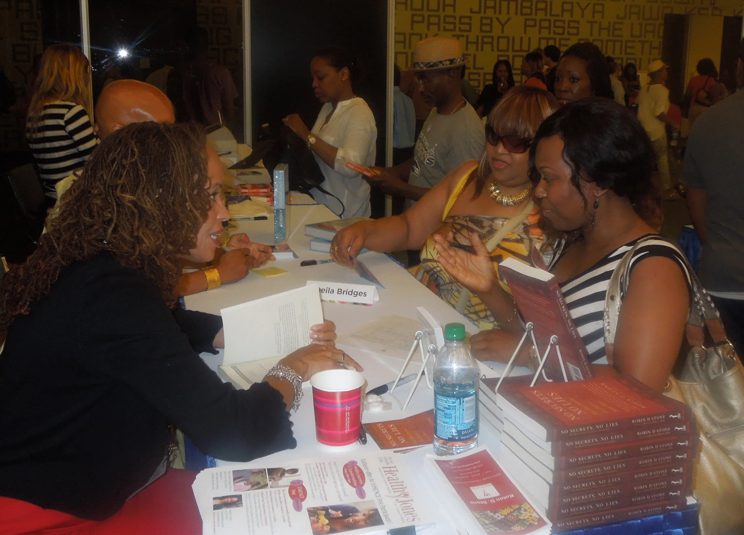 Greeting guests at the book-signing for my book No Secrets No Lies . During that power hour, I also had the pleasure to get to know the gorgeous and talented interior designer Sheila Bridges, whose searing new memoir, The Bald Mermaid , explores her experience of losing her hair to alopecia.