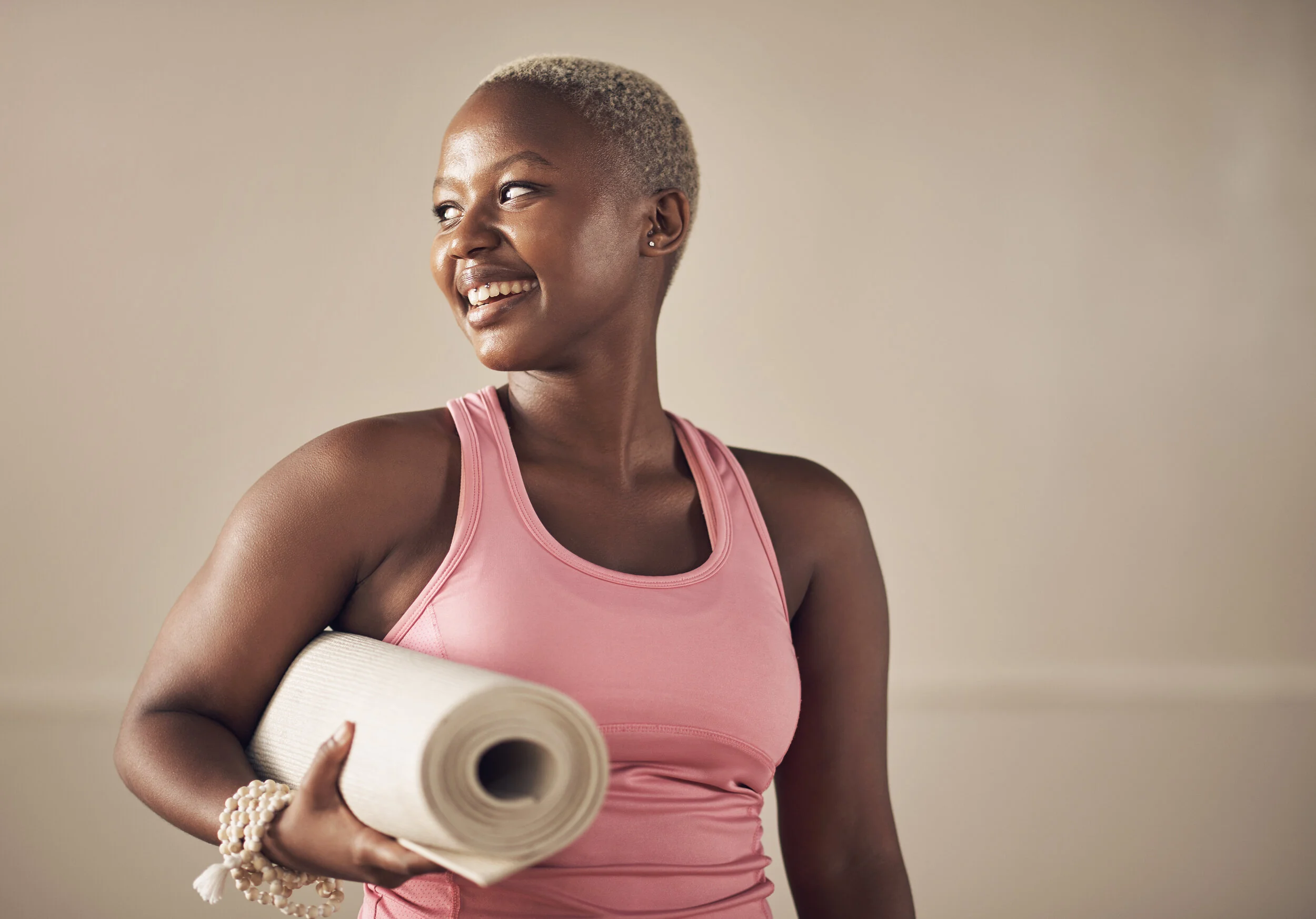 African American Woman w. yoga mat.jpg