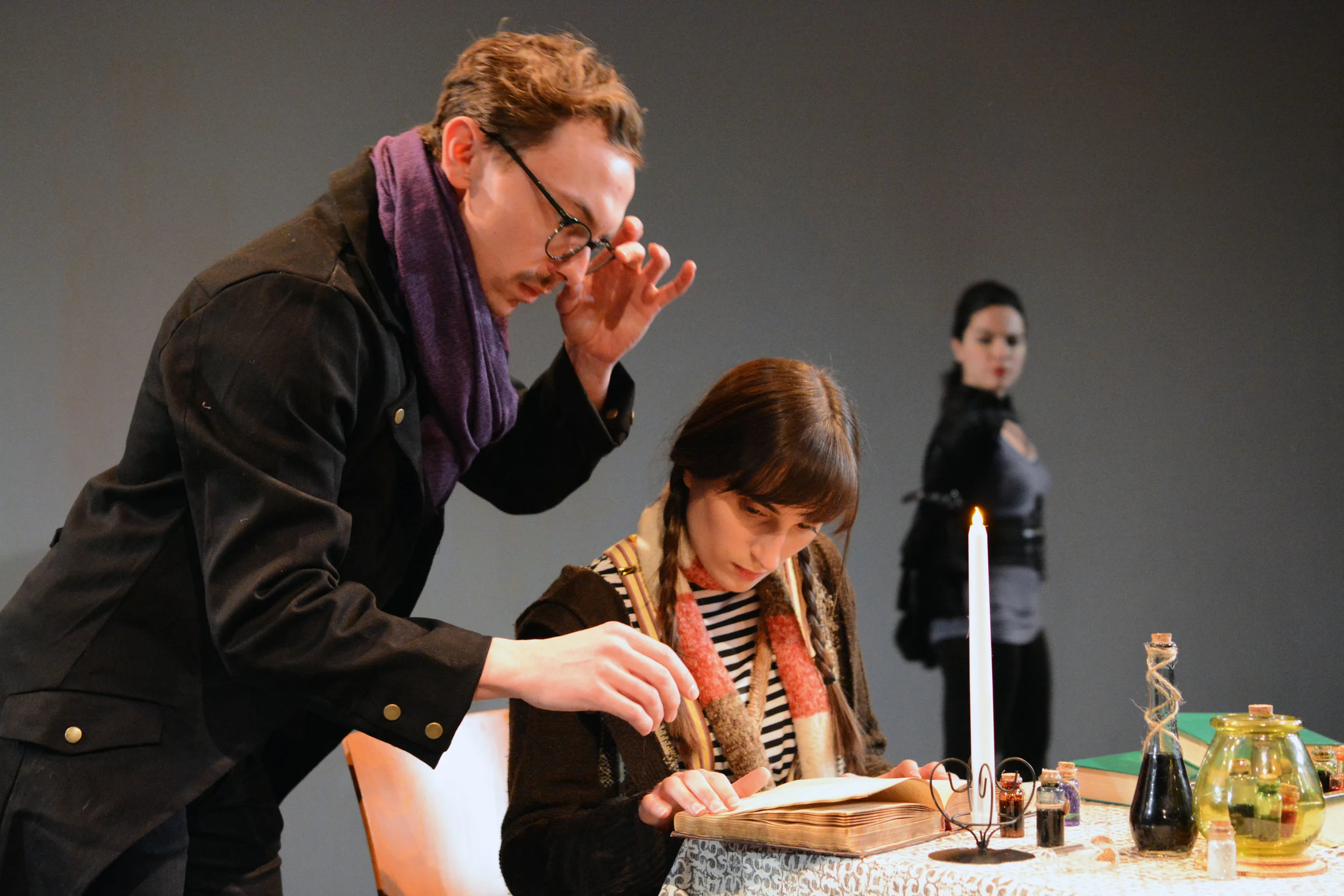 Press photos @ Dixon Place, featuring Brian Knoebel as Professor Schwartz, Jennifer Paldino as Isidora, and Justine Magnusson as Prime Minister