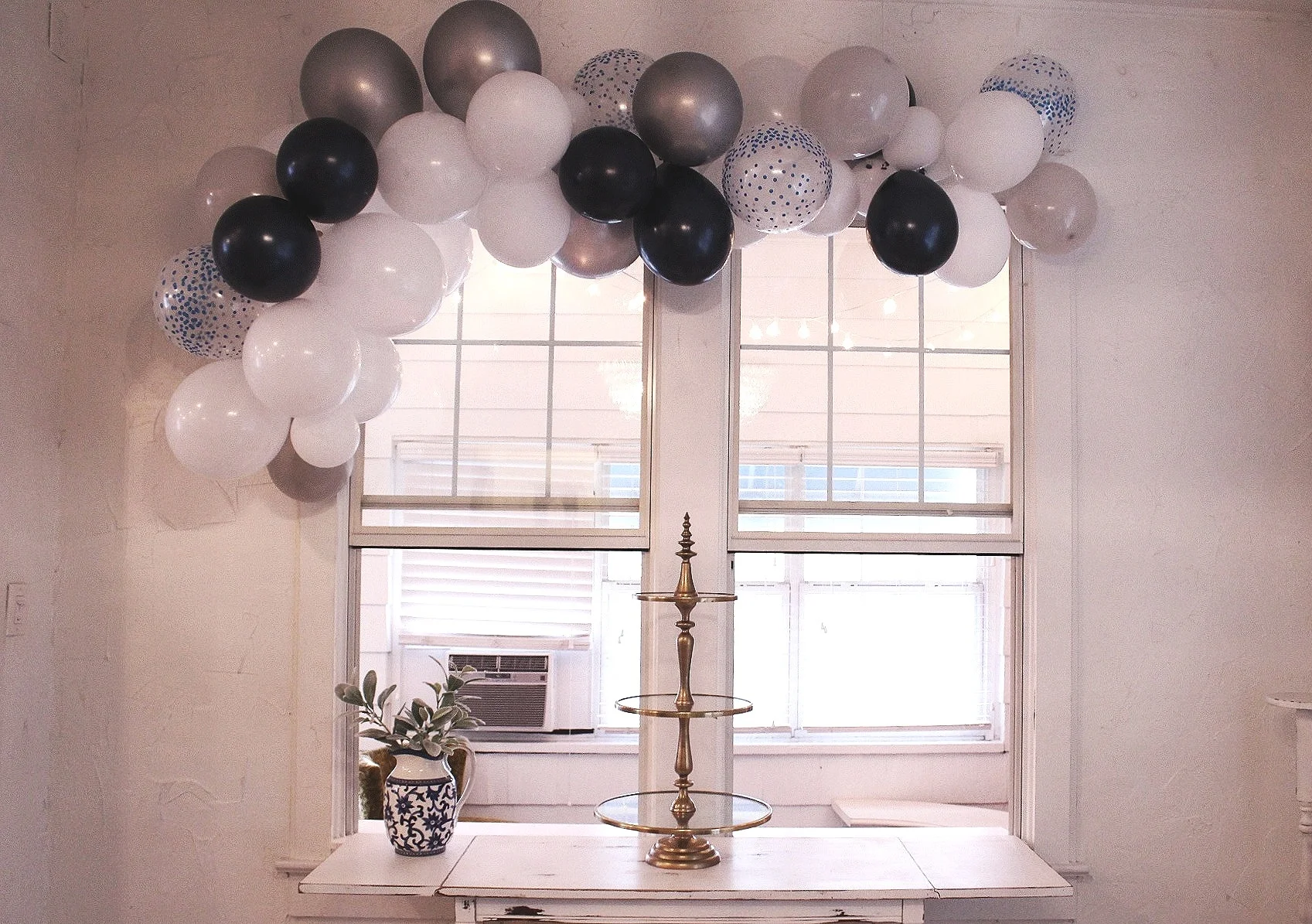 Balloon garlands are the perfect decor element to elevate your entryway, photo backdrop and cake table.
