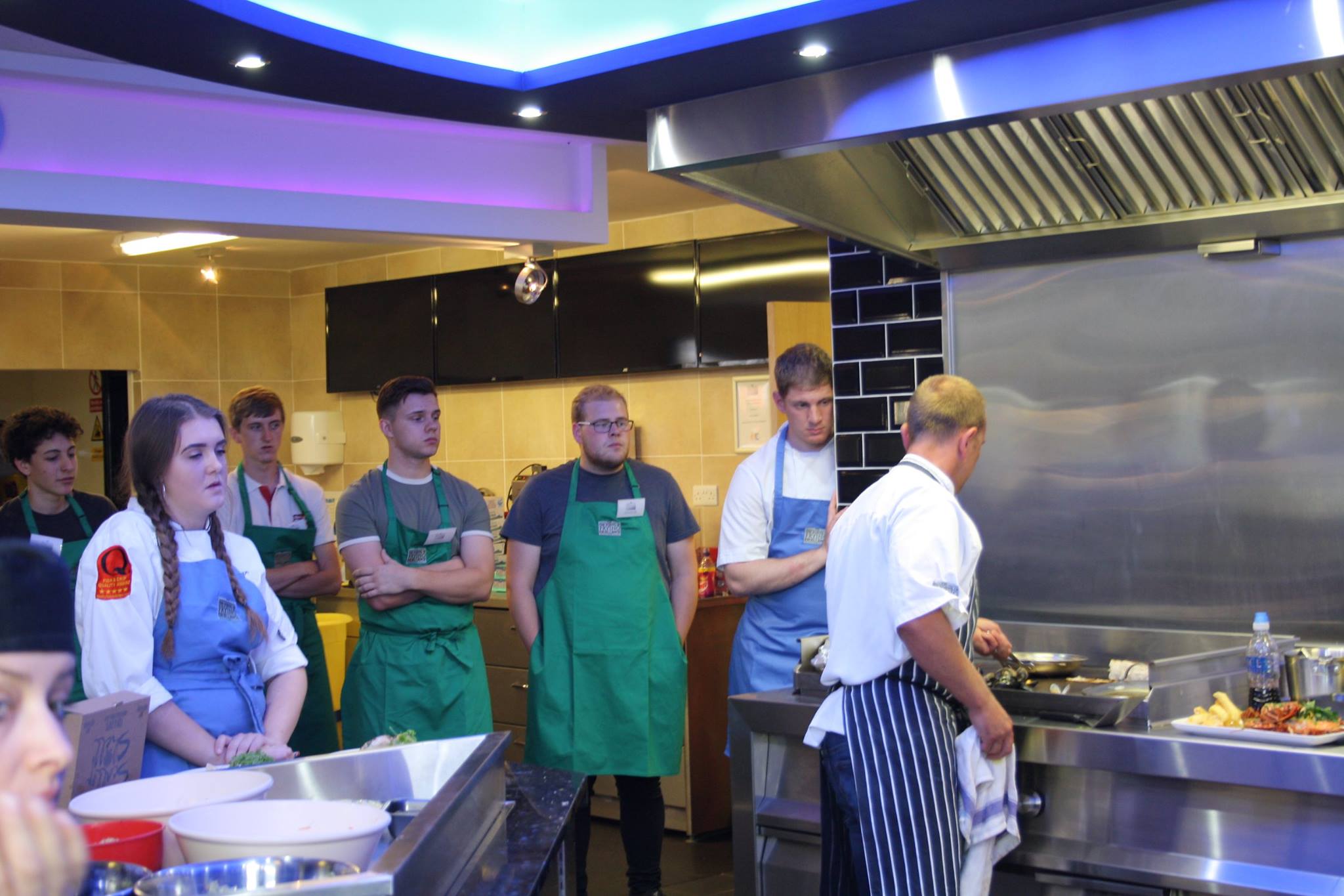 Demonstration of grilling technique.