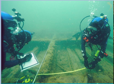  Sea Cadet divers in training measure and document a 19th century shipwreck.