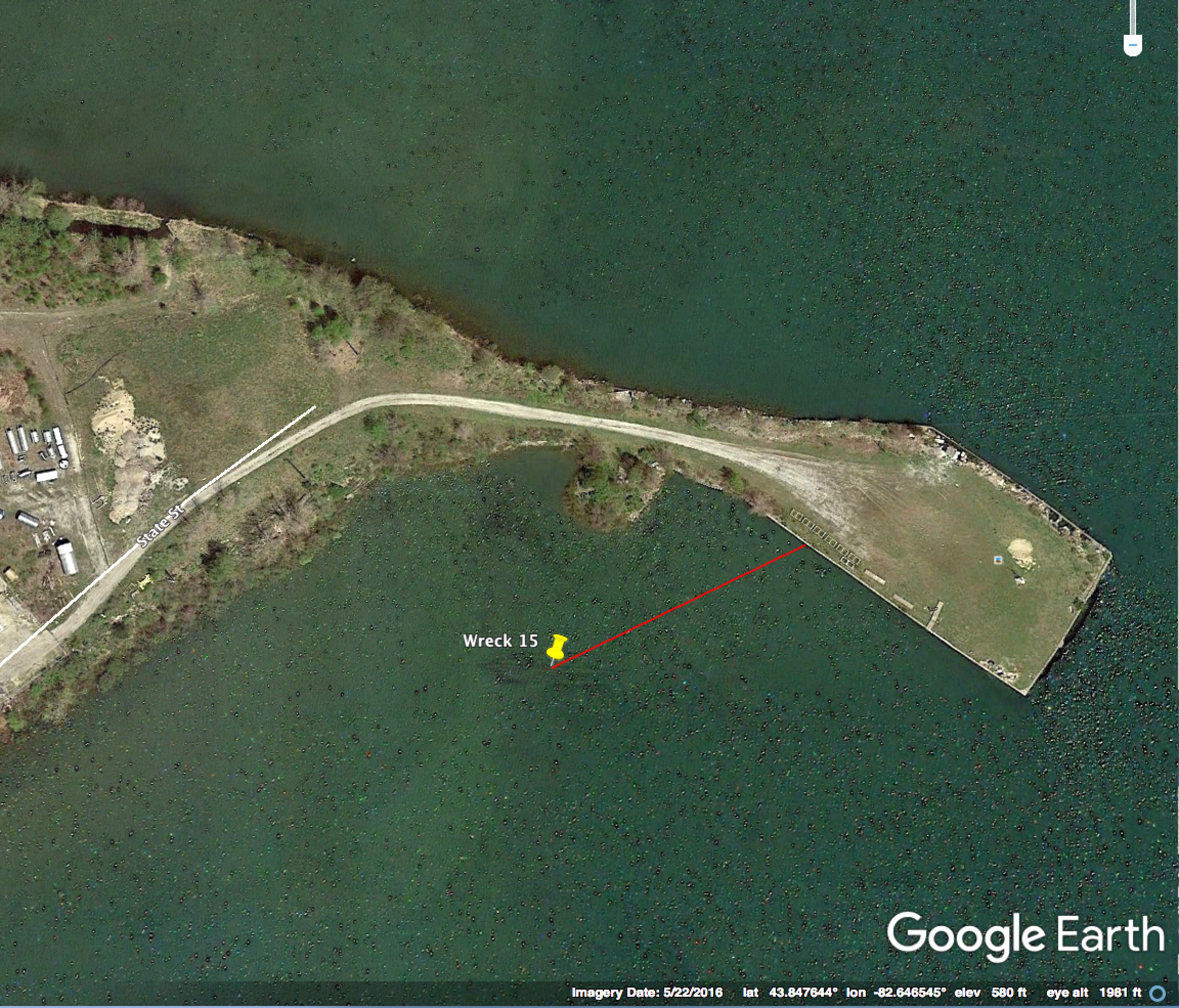 Wreck is 270 ft. from shore on a bearing of 245 degrees. Public access from the Harbor Beach light site at the end of State Street.