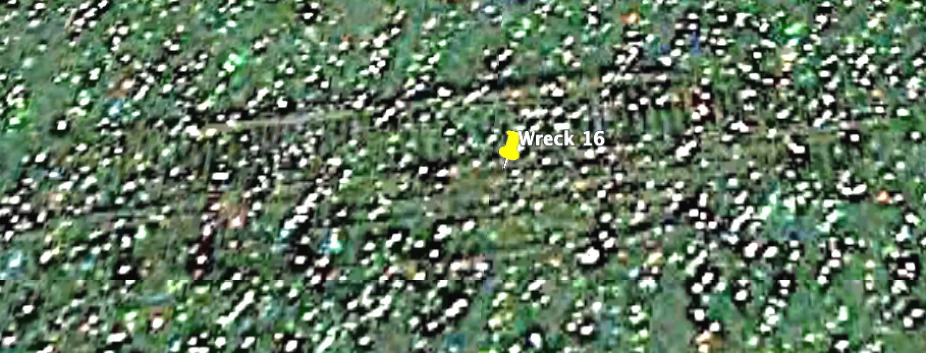Check Maritime Database for vessel details. Location is south side of Harbor Beach.