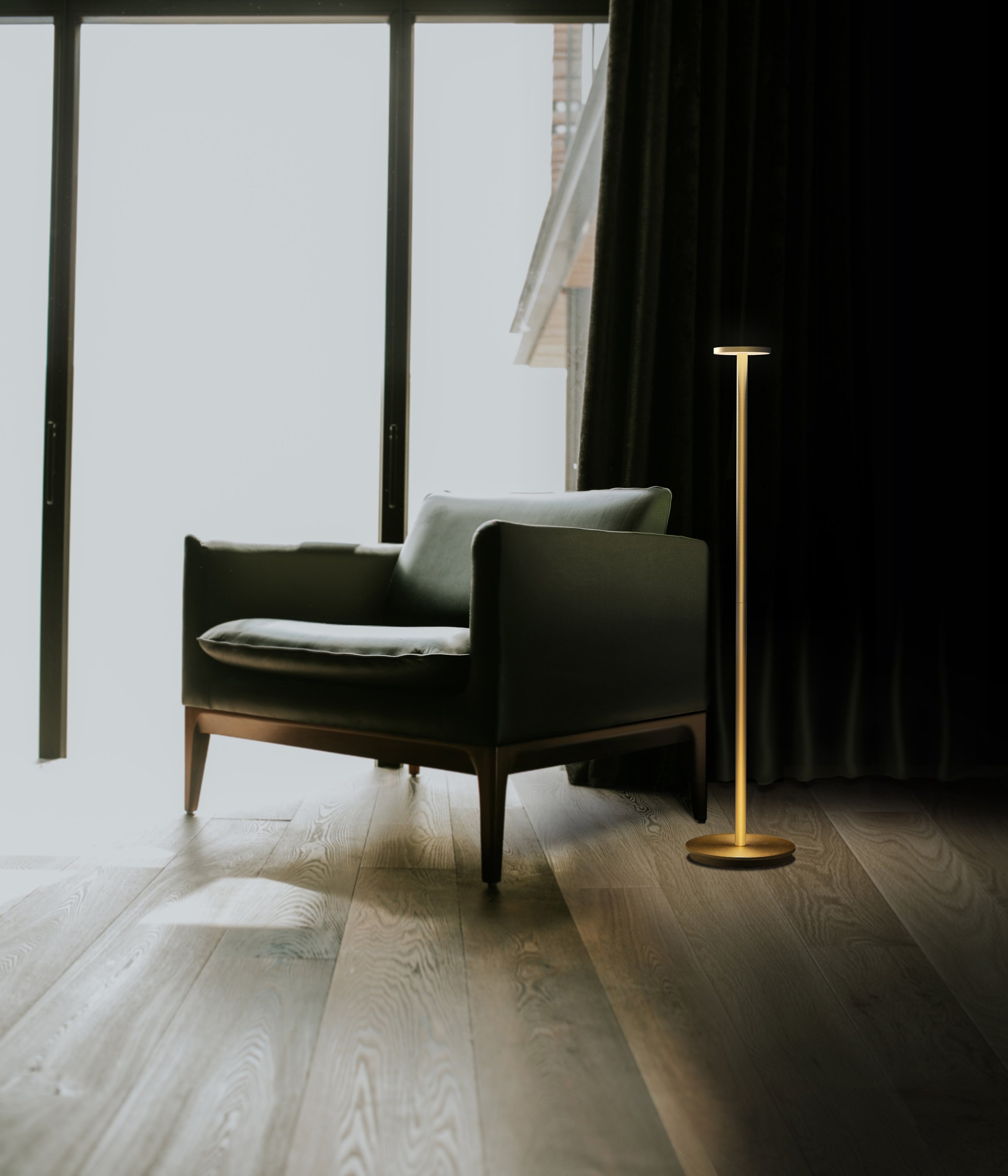 Pablo Designs - Luci Floor - Environmental Image - Brass - Green Chair_300.jpg