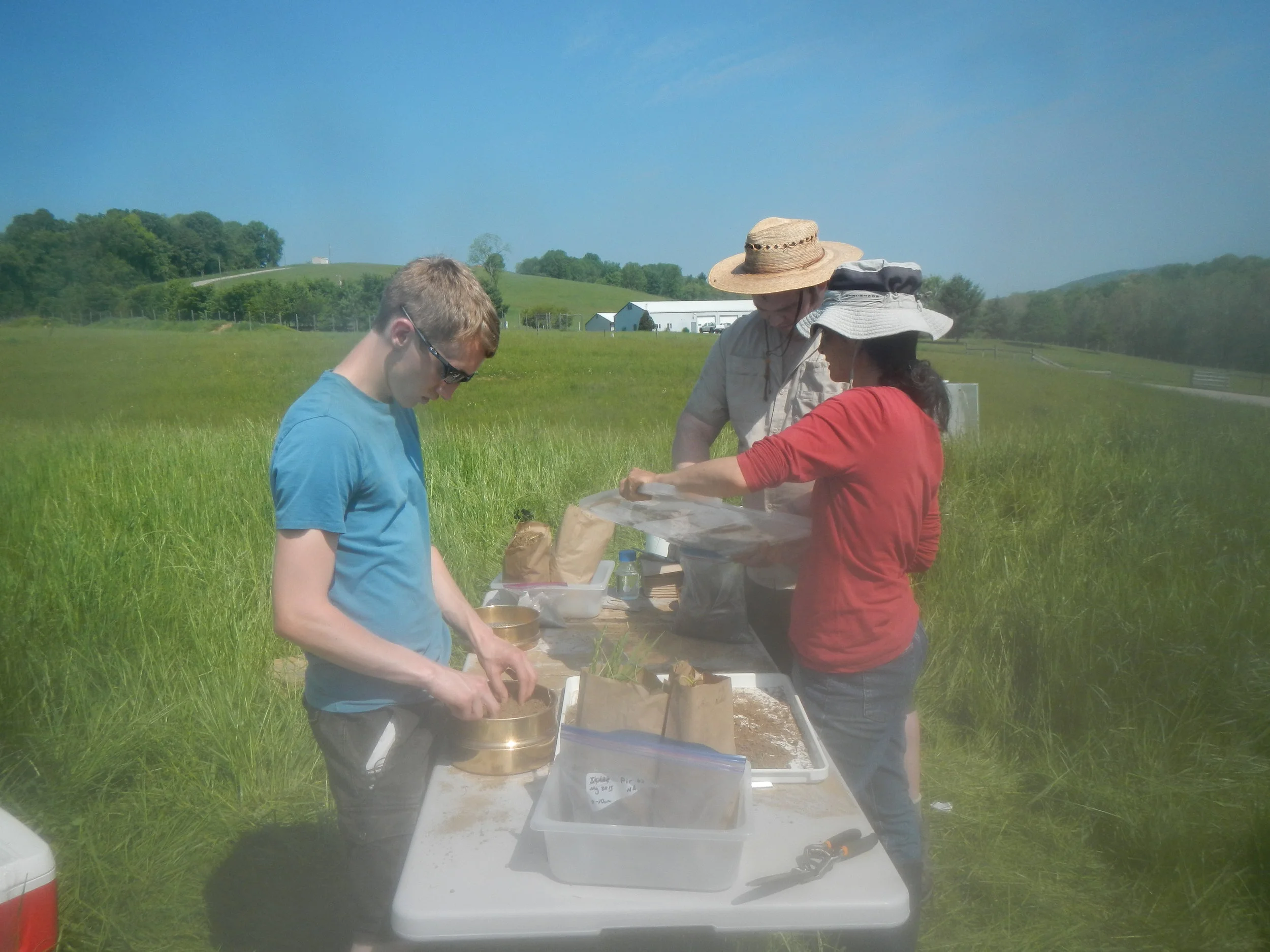 Josh, Steve, and Steffany processing samples during a stable isotope pulse-chase at the S.C.A.R.E. site.