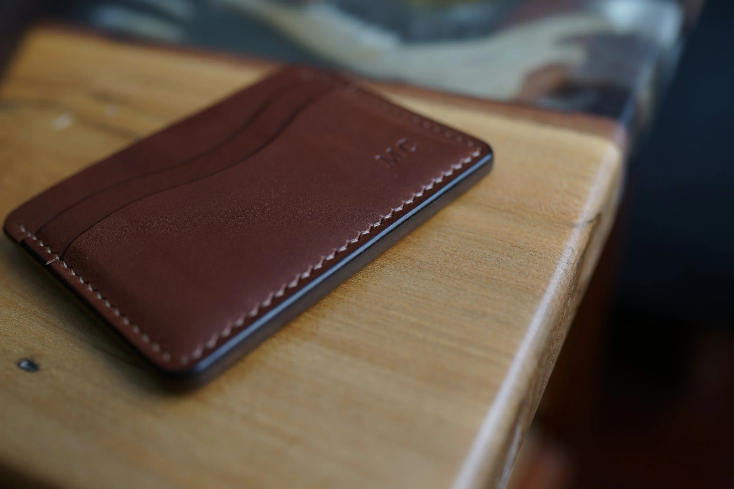 Custom flat wallet; edge detail
