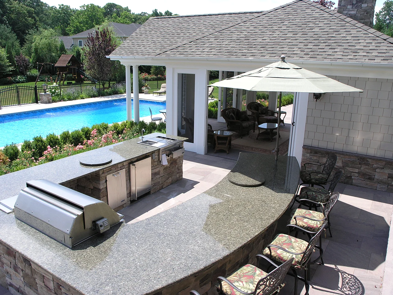 Landscape design with outdoor kitchen in Long Island, NY​​​​​​​