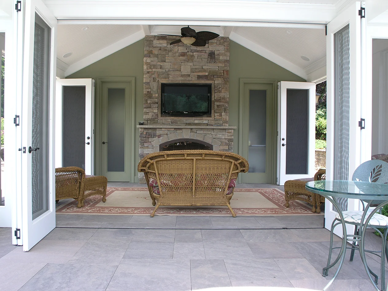 Landscape design with outdoor fireplace in Long Island, NY​​​​​​​