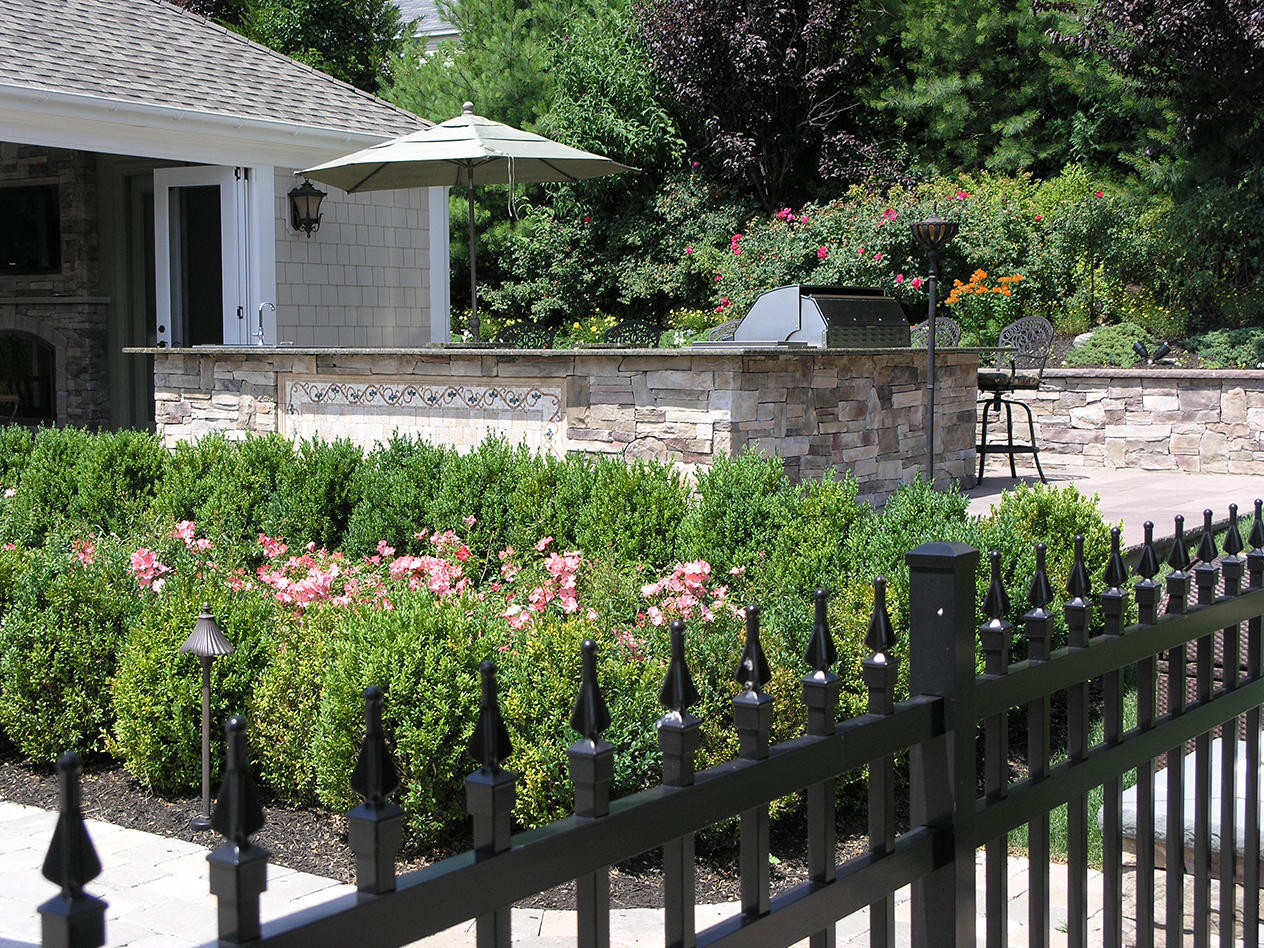 Landscape design with aluminum fence in Long Island, NY​​​​​​​