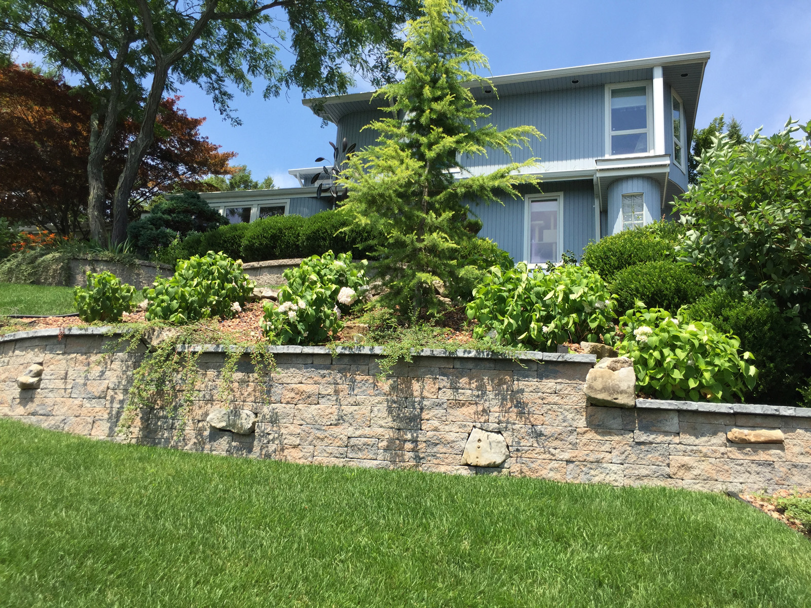  Landscape design with retaining wall in Long Island, NY 