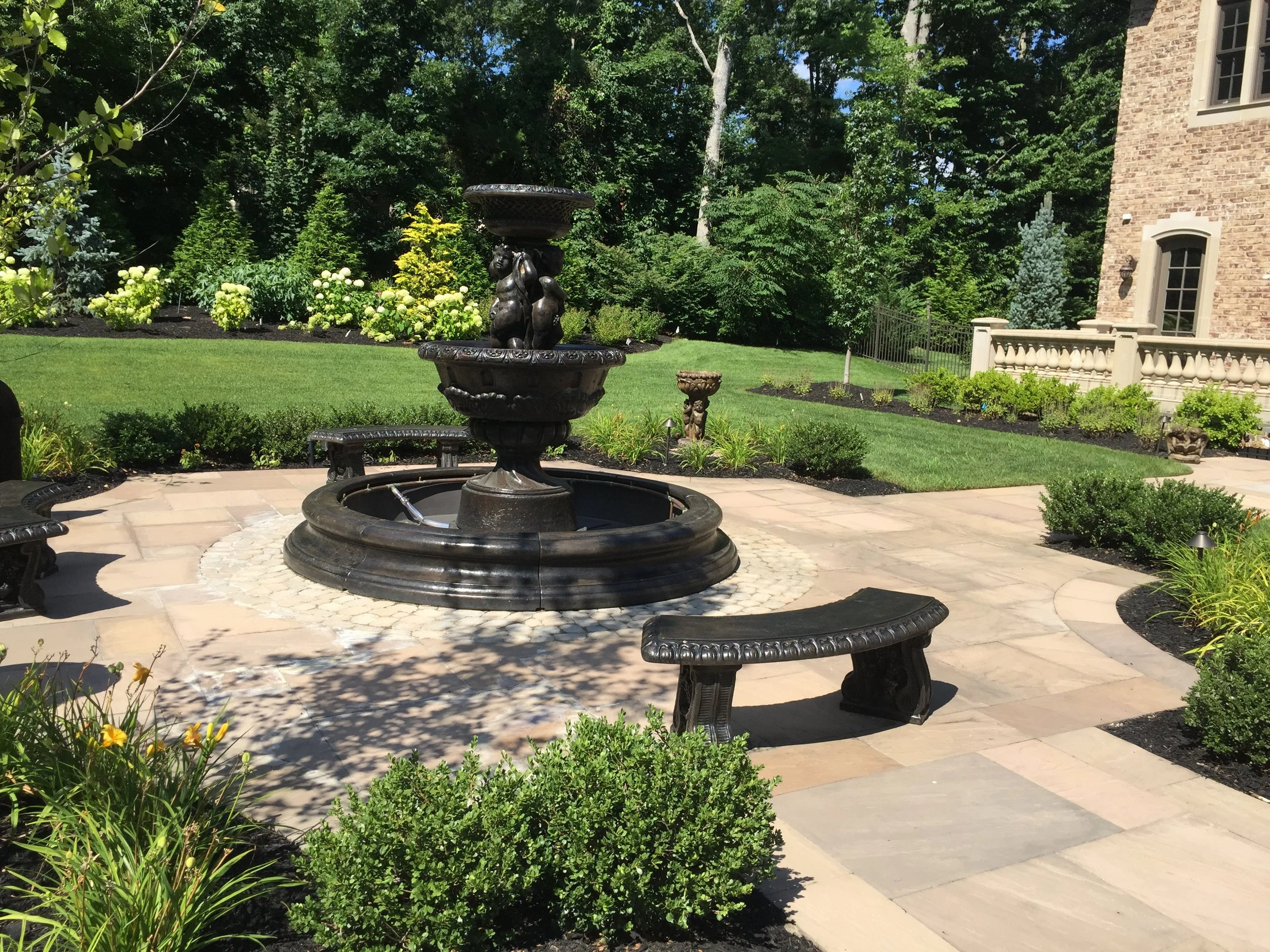 Landscape design with water feature in Long Island, NY